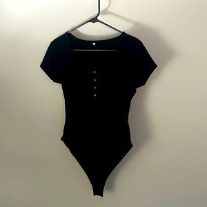 Black button front bodysuit